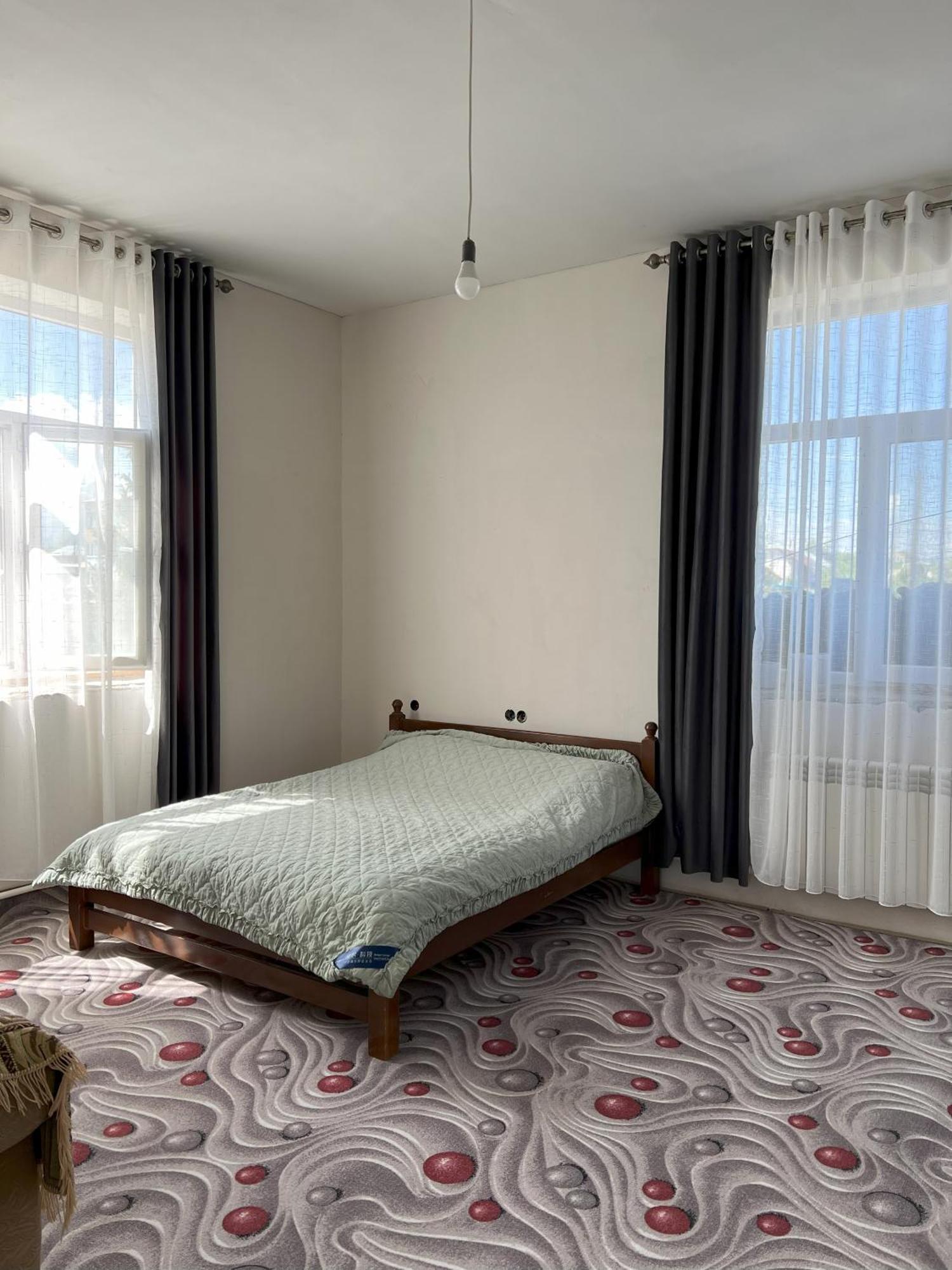 Emir Guest House In カラコル エクステリア 写真